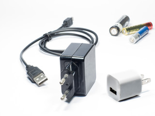 Battery and charger adaptor.
Battery and charger devices on white background