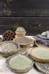 Ancient minerals - black, green, blue clay powder and mud mask 