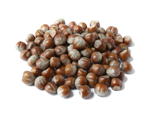 A pile of whole hazelnuts isolated on a white background