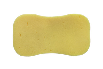 A yellow cleaning sponge isolated on a white background