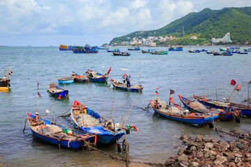 Fototapeta na wymiar Different and colorful fishing boats in Vung Tau.
