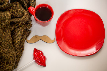 red Cup of hot drink, with Christmas items