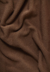 Fototapeta premium A full page of brown fine knitted background texture