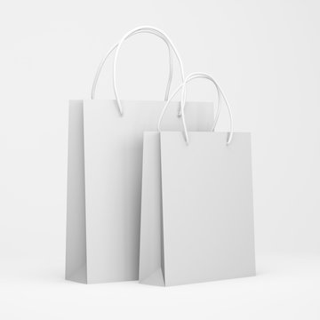 White packages isolated on a white background, shopping bags. Mock up. 3d render