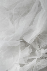 A full page of soft white netting fabric background texture