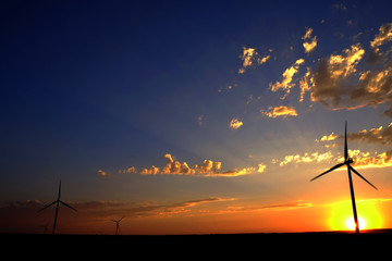 Windmill at Sunset Generating Sustainable Power
