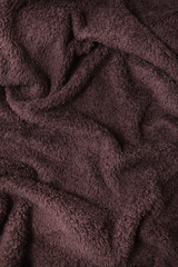 Fototapeta na wymiar A full page of chocolate brown bath robe background texture