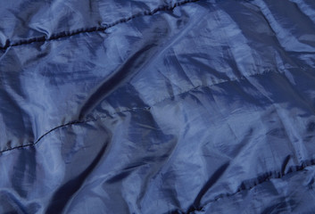 A full page of navy blue sleeping bag texture
