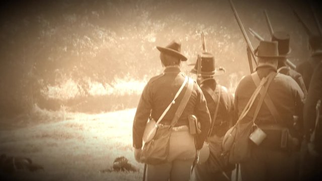 Civil War soldiers shooting across battlefield (Archive Footage Version)