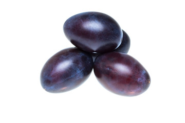 Plums isolated on white background.