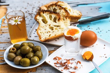 Olive,bread,egg and tea
