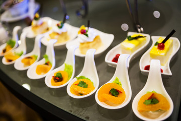 Close-up view of dessert buffet with delicious sweet bakery and