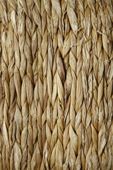 A full page of woven natural reed background texture