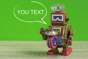 Old robot toy with text frame.