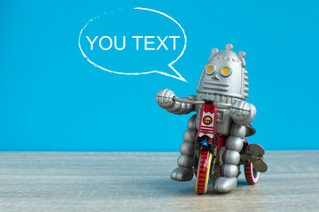 Old robot toy with text frame.