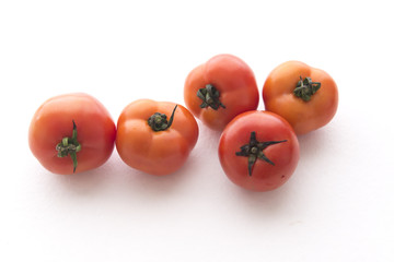A plurality of tomatoes