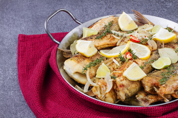 fish fried in a pan