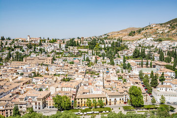 Fototapeta na wymiar Panoramic view of the Albaycin (Albaicin, Albayzín, Albaicín), an old Muslim district in Granada, Spain 