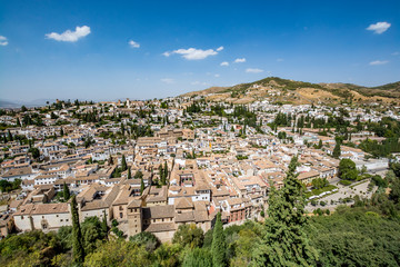 Fototapeta na wymiar Panoramic view of the Albaycin (Albaicin, Albayzín, Albaicín), an old Muslim district in Granada, Spain