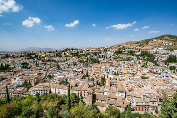 Fototapeta na wymiar Panoramic view of the Albaycin (Albaicin, Albayzín, Albaicín), an old Muslim district in Granada, Spain