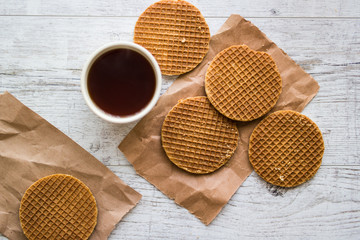 Fototapeta na wymiar Stroopwafels / Caramel Dutch Waffles with tea or coffee.