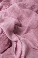 A full page of soft pink linen fabric background texture 