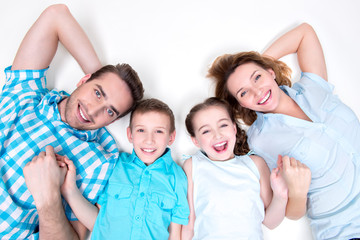 High angle portrait of caucasian happy smiling young family