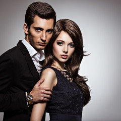 Studio portrait of young beautiful couple in love
