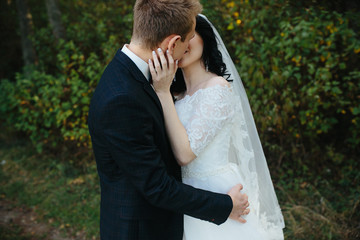 Beautiful wedding couple kissing