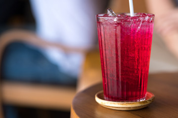 Strawberry soda drink for refreshment.