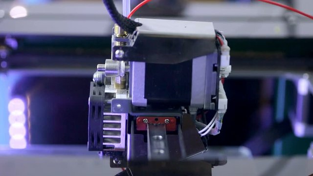 Close up. 3D printer making part of human prosthesis. HD.