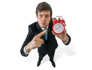 Discipline at work concept. Angry boss is pointing on clock. Isolated on white background.