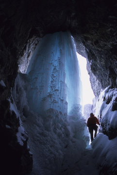 An Ice Climber Making His Way Up The Candlestick Maker WI 4, Ghost River, Foothills, Rocky Mountains, Alberta, Canada