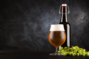 Beer glass on dark background