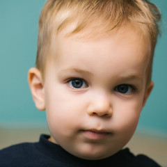 Little serious boy child