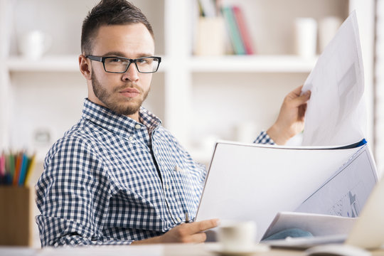 European man doing paperwork