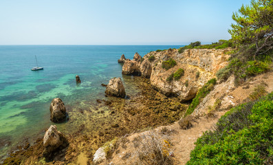 Fototapeta na wymiar Scenic golden cliffs near Alvor, Portimao, Algarve