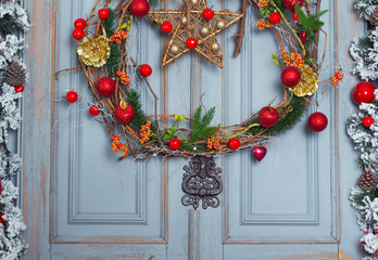 Christmas Wreath decoration at door for holiday. Winter Time