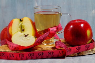 fresh apples, apple juice or apple cider vinegar in your diet - soft focus
