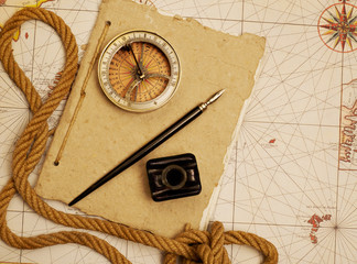 Vintage compass and journal