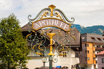 Wrought metal ornamental pharmacy street sign in Austria - 122552250