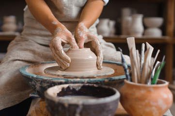 Potter teaches how make clay pot