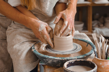 Potter teaches how make clay pot
