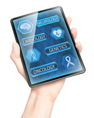 Tablet displaying medical menu held in hand
