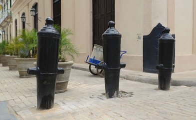 Historic cannons sunk into the street in Havana, where he serves as a barrier against the entry of cars.