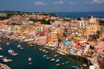 Fototapeta na wymiar View of Corricella, old fisher port in Peocida, Naples, Italy 