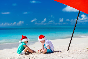 Kids at beach on Christmas