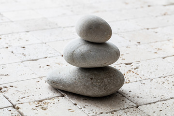 Fototapeta na wymiar symbol of mindfulness, balance and meditation over limestone, copy space
