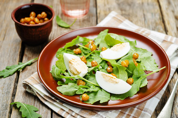 Roasted chickpeas eggs arugula salad