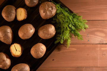 Naklejka na ściany i meble baked potatoes on a table
